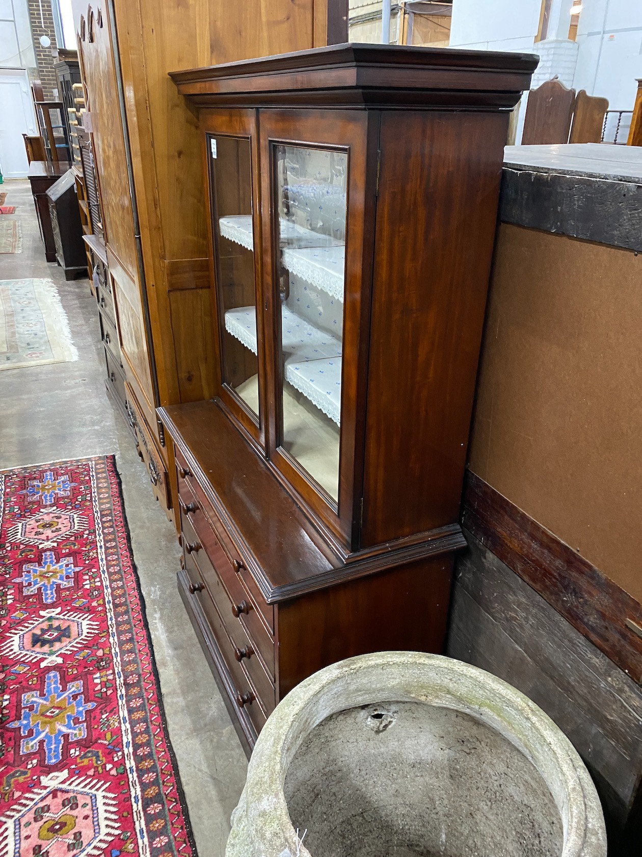 A Victorian mahogany chest with bookcase top, width 105cm depth 49cm height 173cm